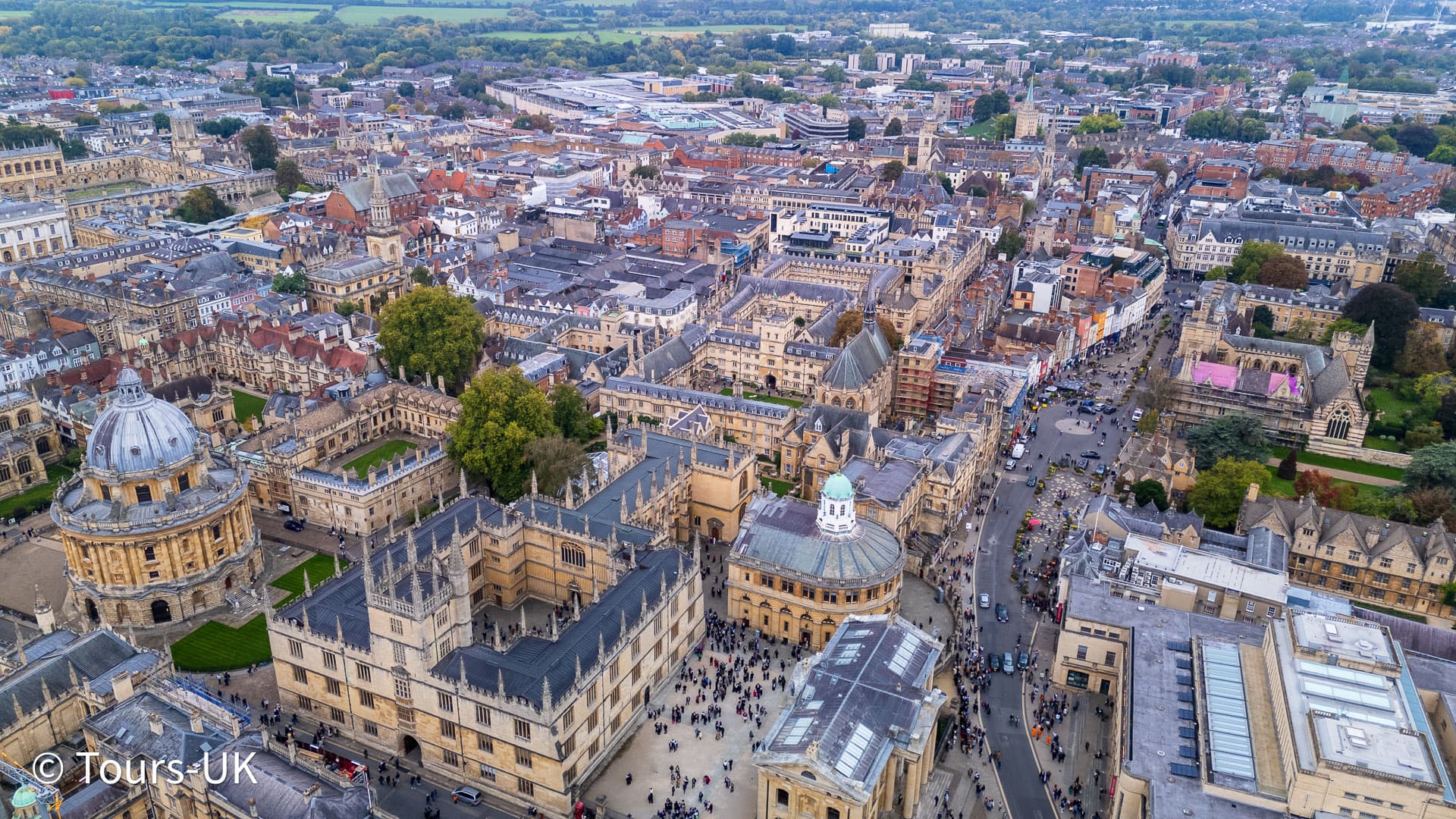 Aerial image of the Sheldonian Theatre, Oxford, with its domed roof and classical design.